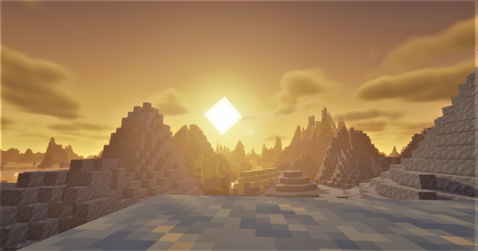 A Minecraft world at sunset, with blocky mountains against an orange sky.